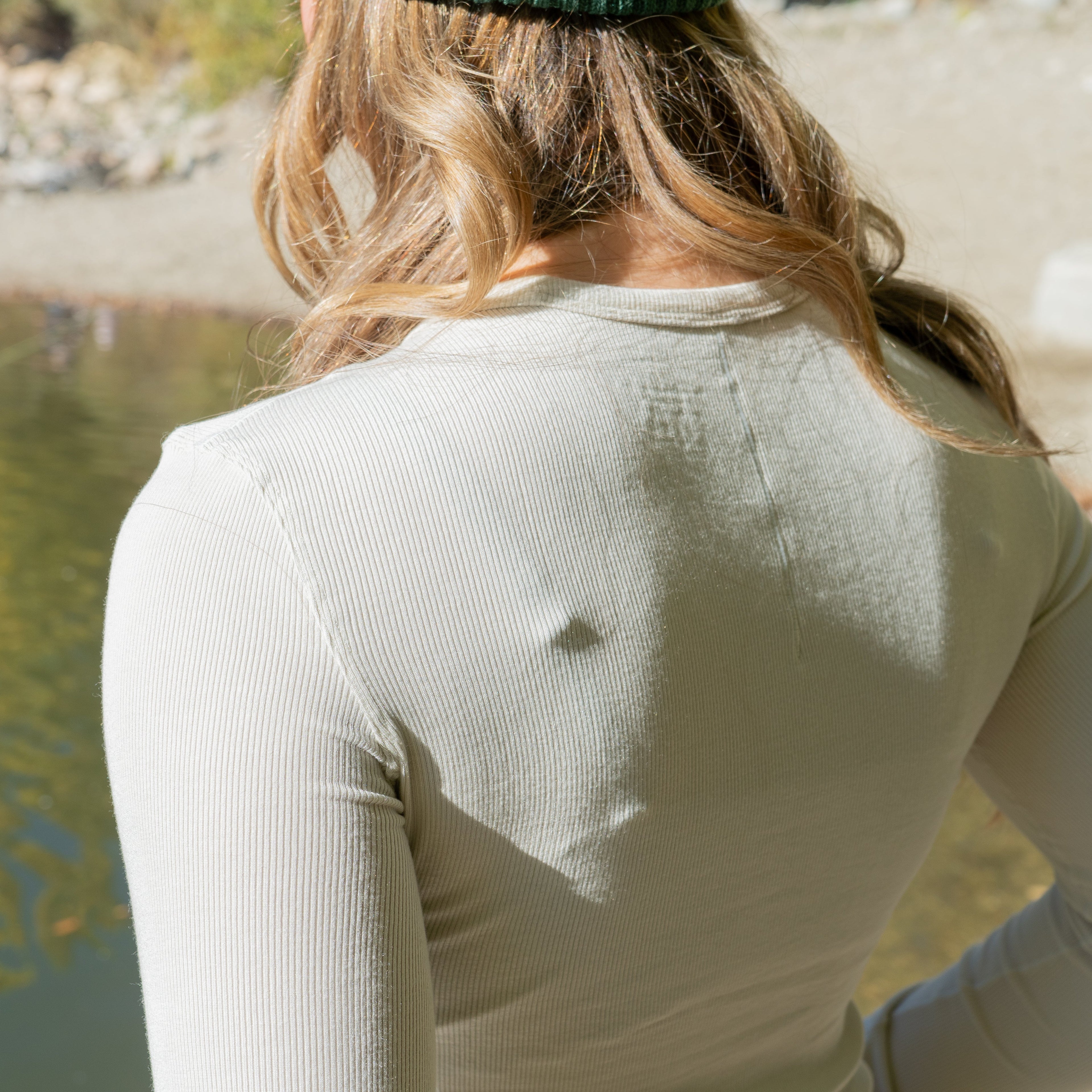 Close-up of ribbed texture on gray modal long sleeve fishing shirt.