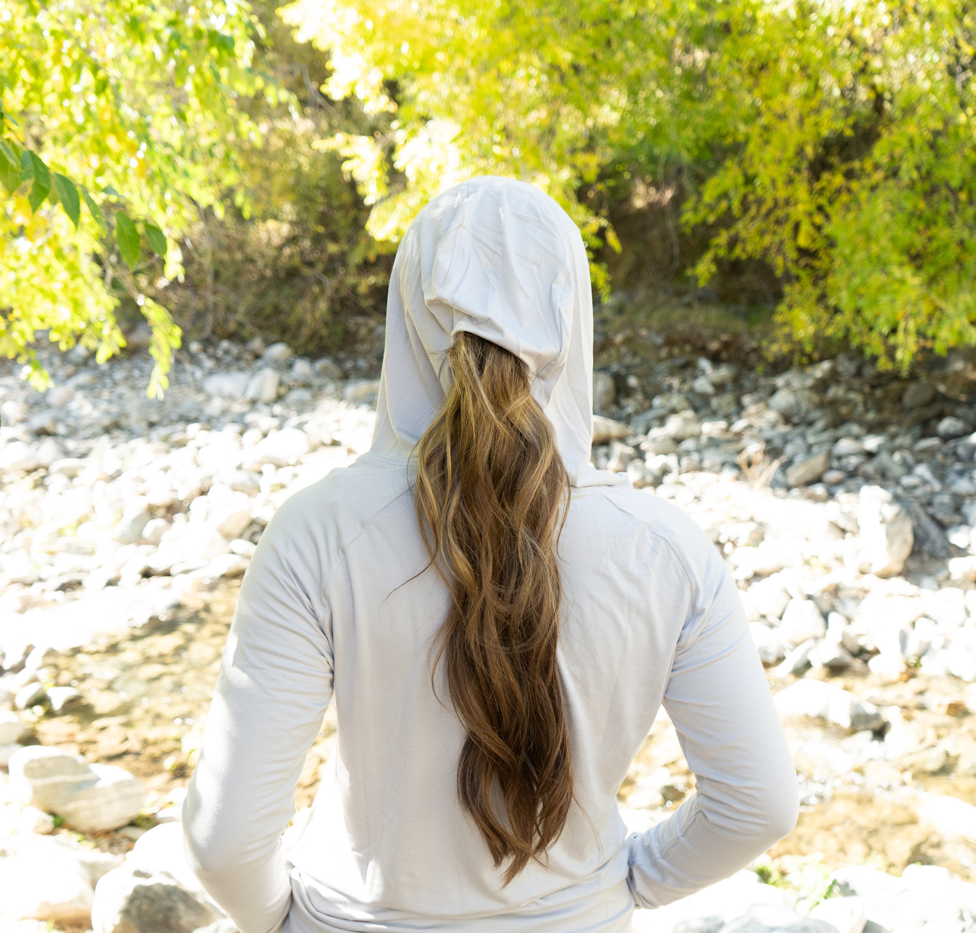 Gray Brook Bamboo Sun Hoodie featuring a subtle ponytail opening designed for comfort and airflow during fishing and outdoor wear.