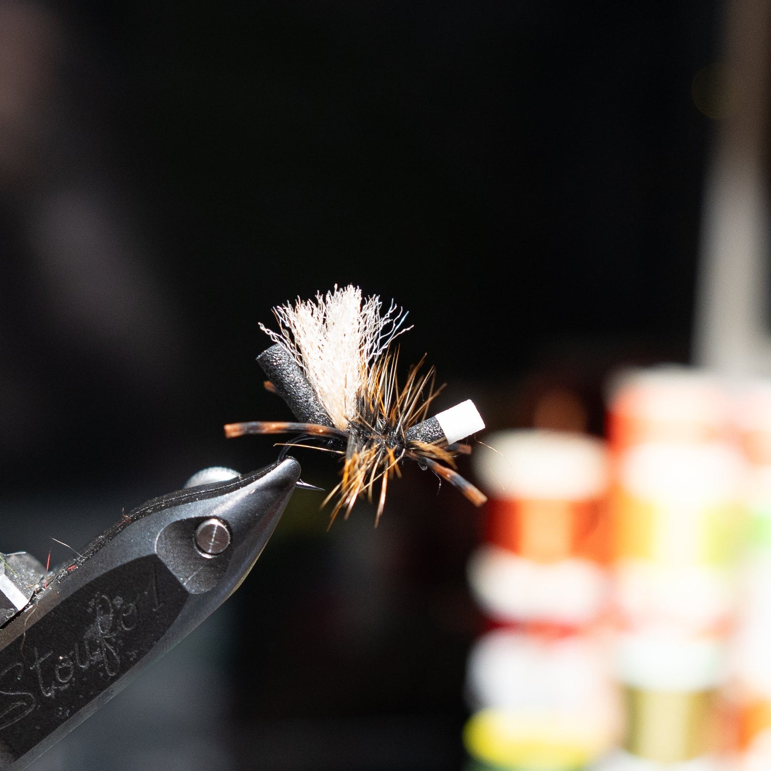 Hand-tied size 20 Bionic Ant 2.0 fly using premium materials for technical trout fishing conditions.