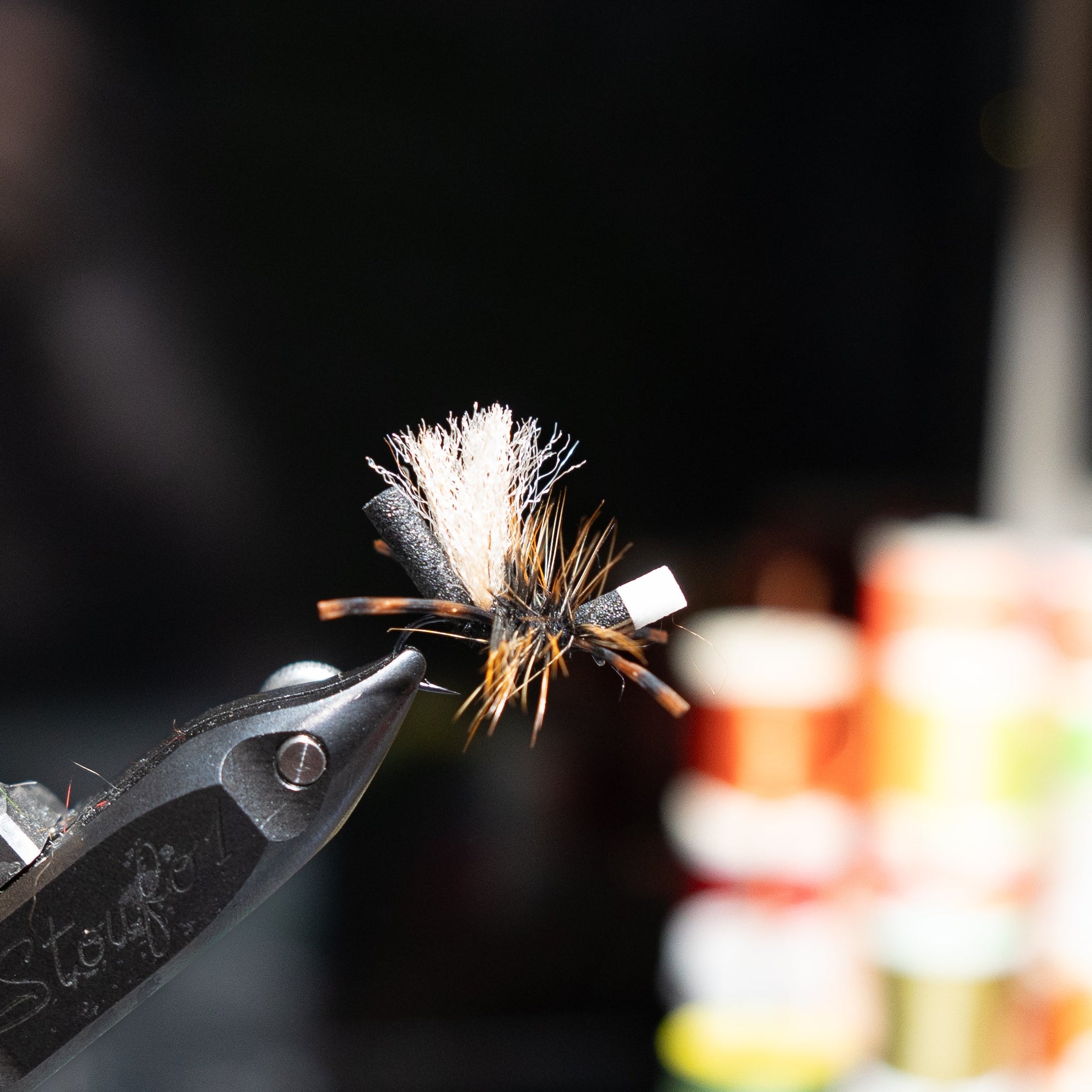 Hand-tied size 20 Bionic Ant 2.0 fly using premium materials for technical trout fishing conditions.