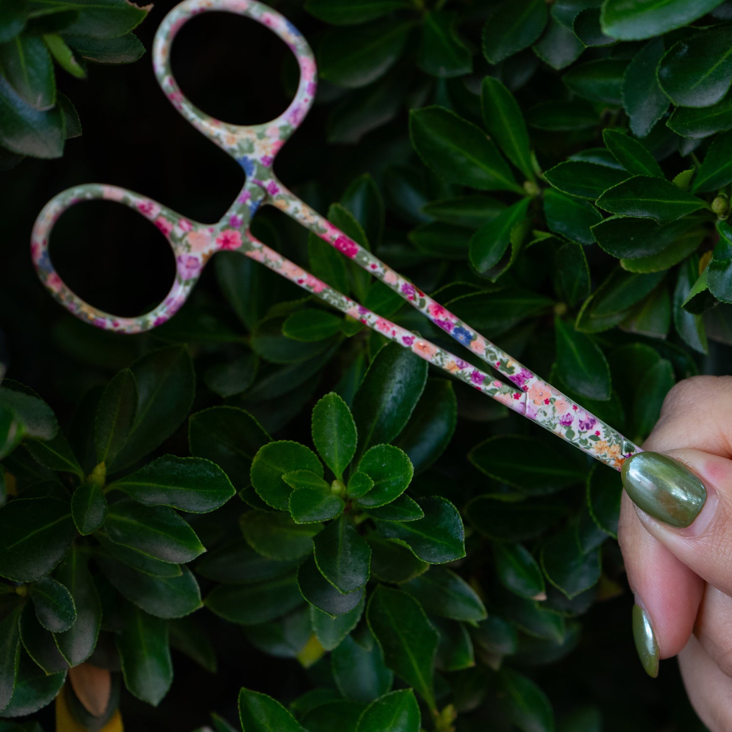 Brook Floral Hemostats styled with fly box, line, and tools in a flat lay for women’s fly fishing accessories.