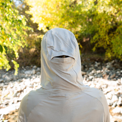Back view of the Gray Brook Bamboo Sun Hoodie highlighting the functional ponytail slot and relaxed hood design
