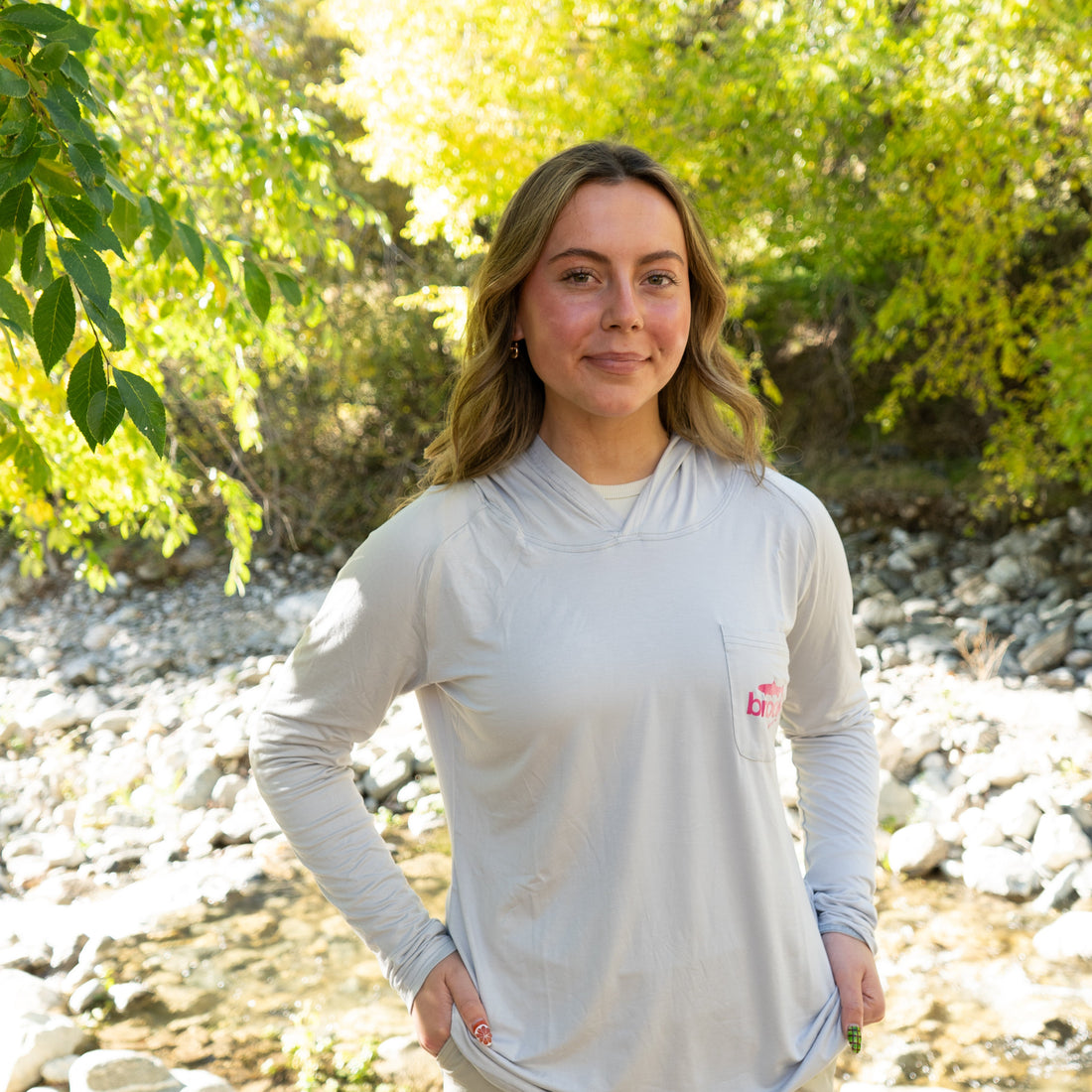 Close-up of soft bamboo fabric on women’s gray UPF 50+ sun hoodie